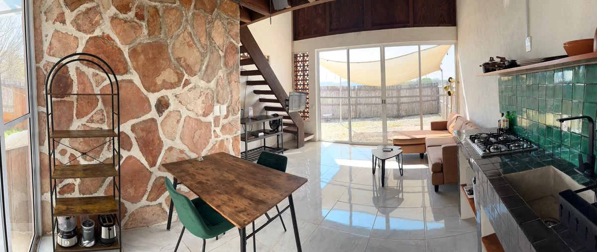 Finished interior of Casa Flamingo, photographed from the kitchen toward the terrace